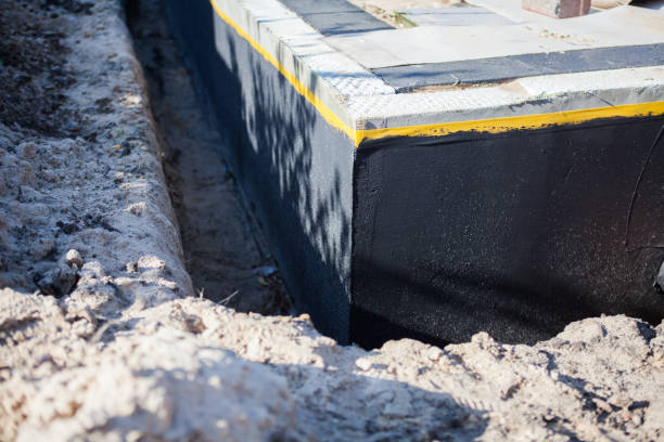 Professional Waterproofing technician working in Bowler, WI
